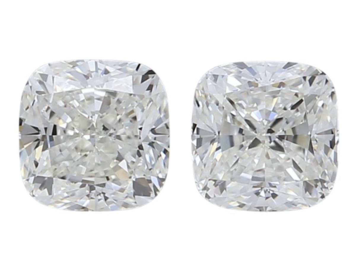 (GIA) 1.00CT ET PAR HØYKVALITETS PUTESLIPTE NATURLIGE DIAMANTER. G-H/VVS1-VVS2.